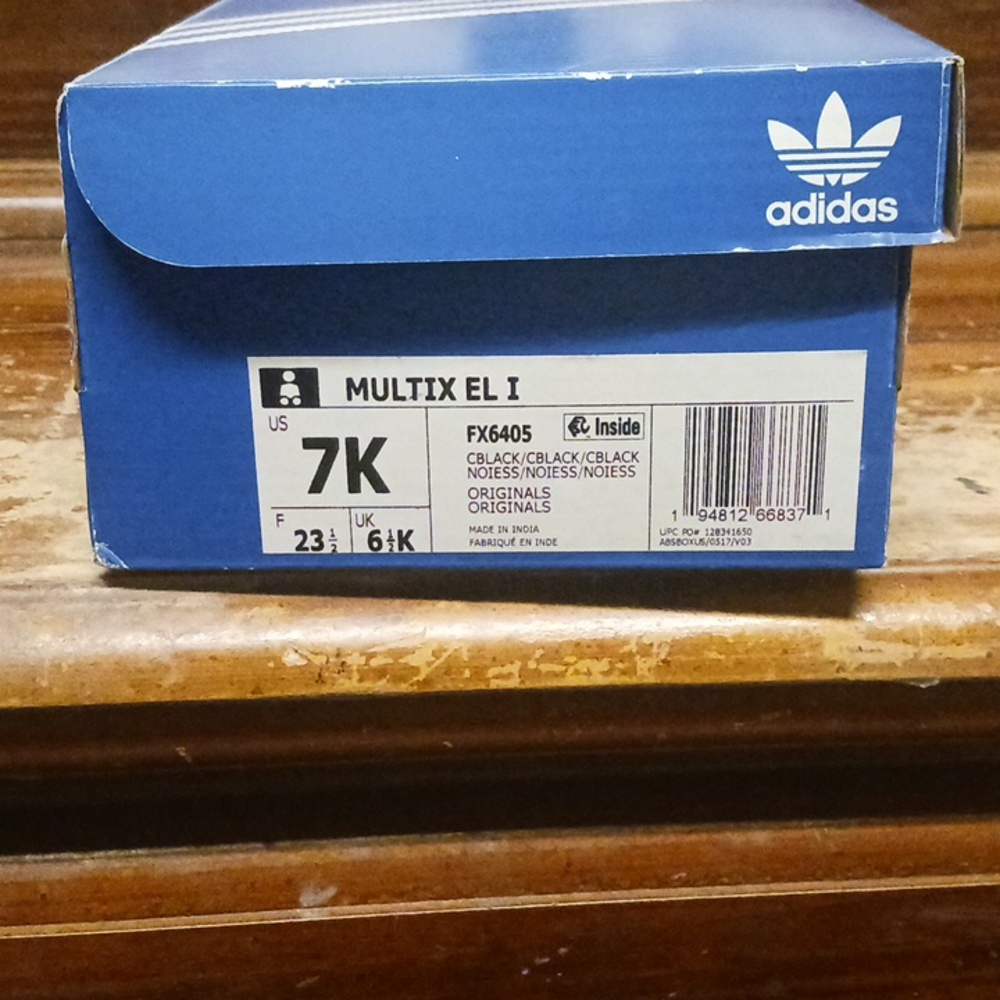 Baby size 7 Adidas black